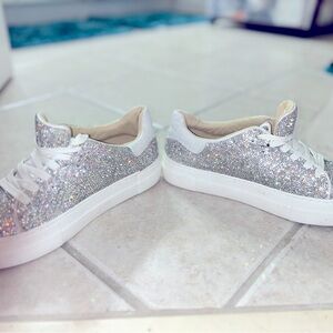Betsy Johnson Sidny silver rhinestone sneakers.